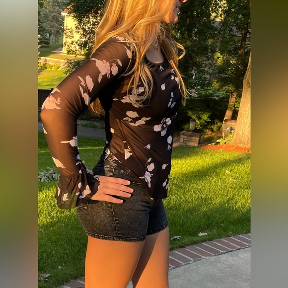 Black mesh top with flared out cuffs. - Picture 2 of 4